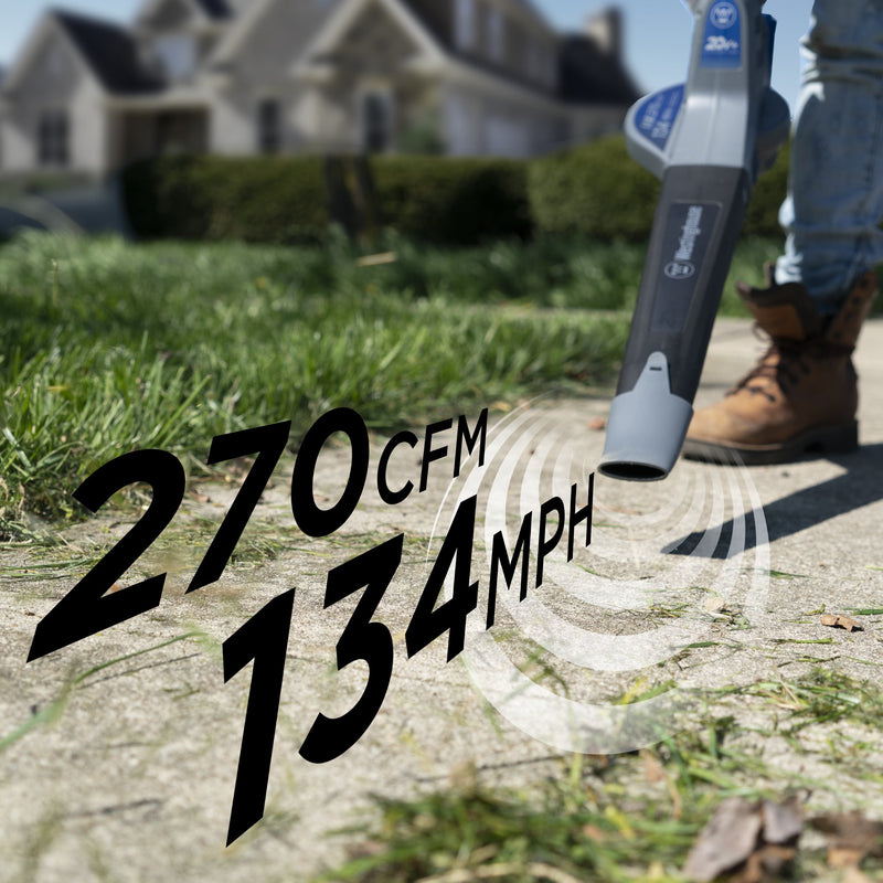 Closeup of leaf blower blowing grass off sidewalk. Text on screen says 