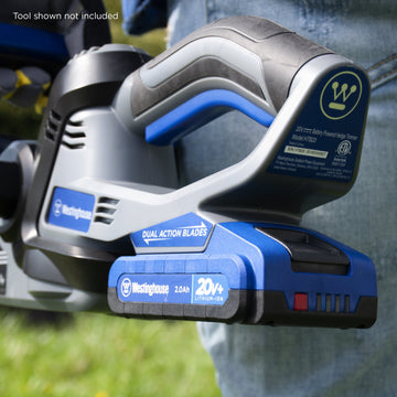 Closeup of 2 Ah battery plugged in to Westinghouse cordless tool