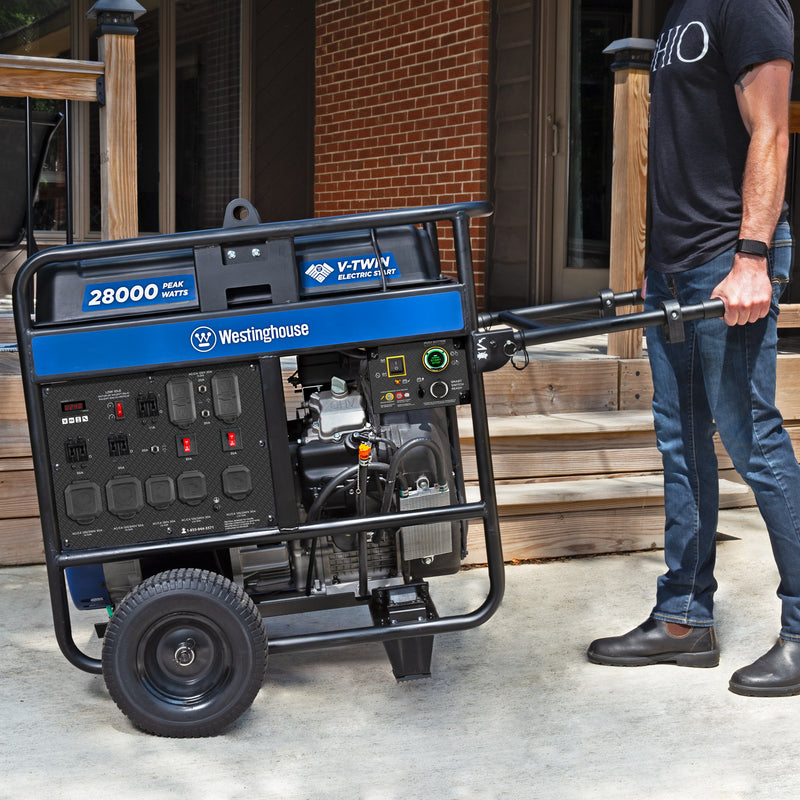 Westinghouse | WGen20000c portable generator shown being wheeled across concrete