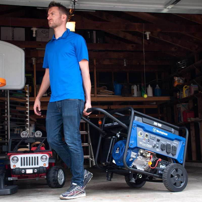 Westinghouse | WGen7500 portable generator being wheeled out of a garage.